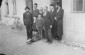 A group of religious Jews pose outside a building in the Rovno ghetto. © United States Holocaust Memorial Museum, courtesy of Sarah (Sally) Light
